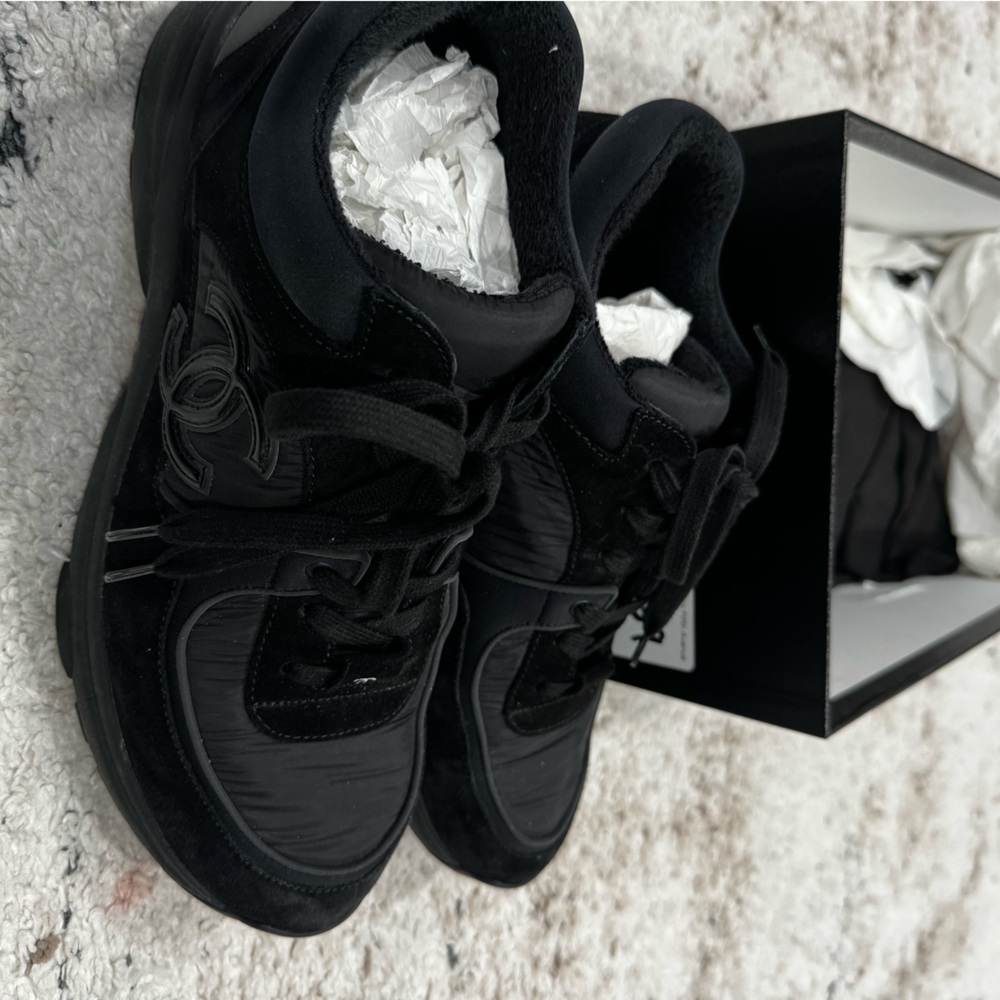 Pre owned Chanel black suede trainers.